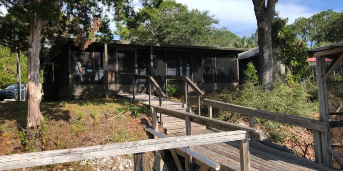 river front home sitting on the Carrabelle River