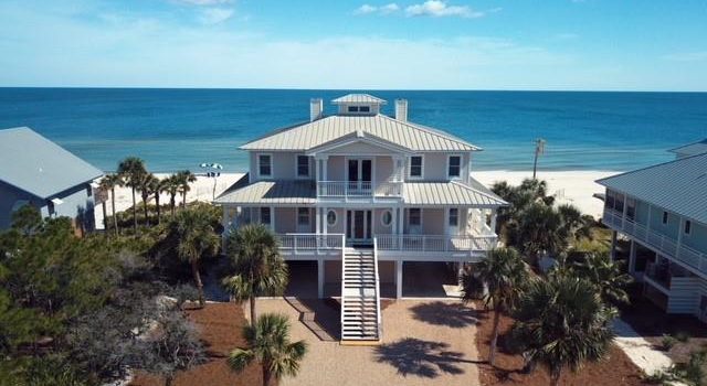 Plantation gulf front home with fireplace