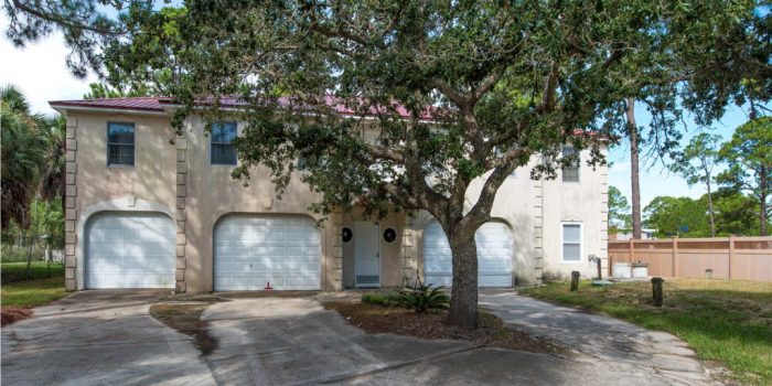 canal front home with dock located in the Gulf Beaches