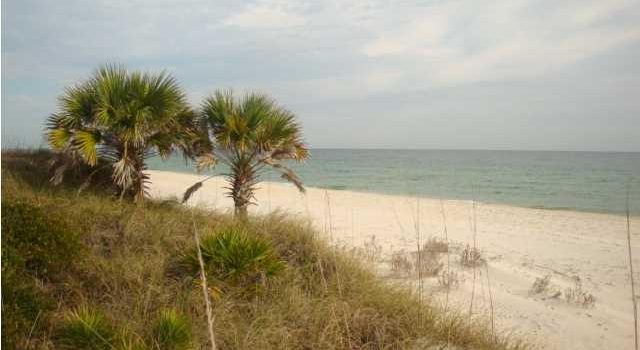 1.000 Acre gulf front lot located in Schooner Landing in the Plantation