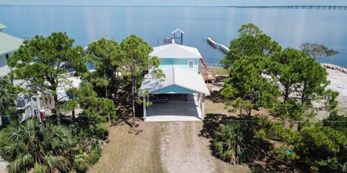 bay front home with private dock located in the Gulf Beaches