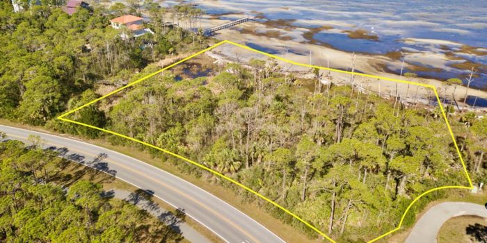 2 acre bay front lot located near Bob Sikes Cut in Heron Bay Village in the Plantation