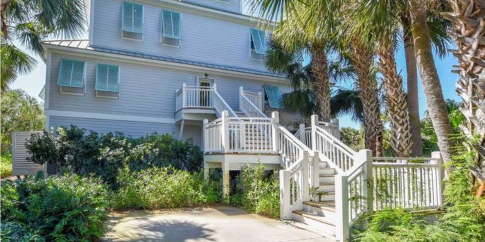 Home with private pool and boat dock located on Bob Sike's Cut in Schooner Landing